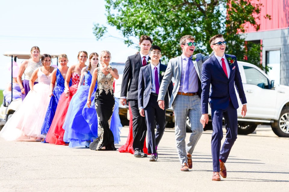 The Class of 2020 at Lampman School paraded down Main Street Saturday afternoon as part of a grad celebration organized by a parents’ committee. Photo by Wanda Harron Photography