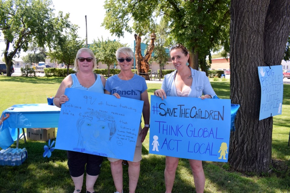 From left, Tammy Rasmussen, Tracey Samenook and Jennifer Kuchinka were among those who attended the Save the Children demonstration in Estevan.