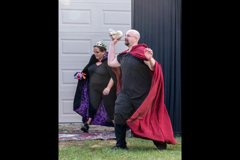 Claudius (James Jones) throws the skull that represents past enemies.