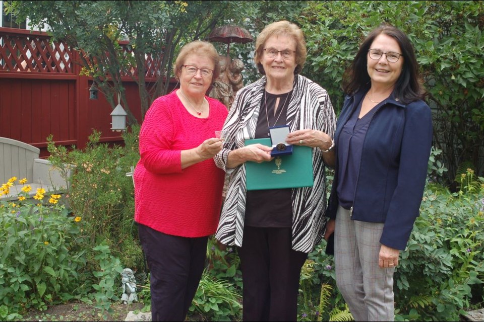 Jean Babiuk, middle, of Sturgis was photographed with Lillian Smith, left, who nominated Babiuk and Cathay Wagantall, MP for the Yorkton Melville area when Wagantall presented Babiuk with a volunteer recognition award on August 12.