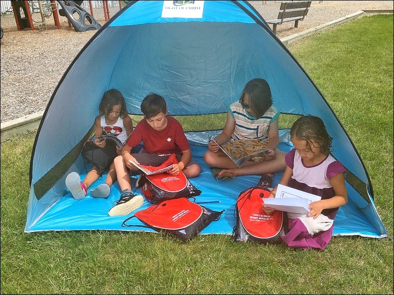 As part of the literacy project this summer, Light of Christ Catholic Schools introduced “Pages in t