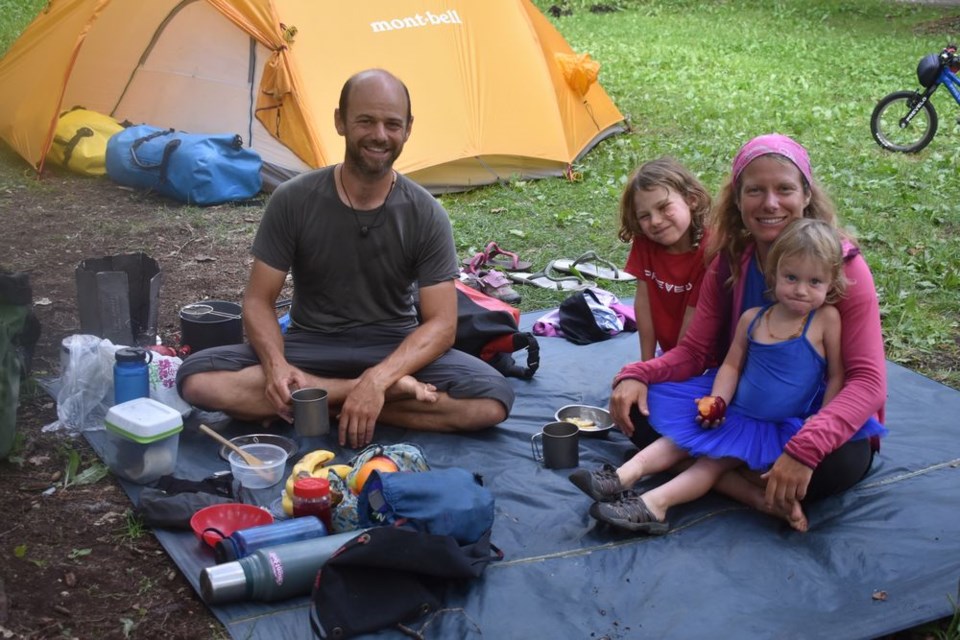 Camping at Madge Lake last week was a family of nomads, originally from Switzerland, who are travelling around the world by bicycle. From left are: Xavier, Nayla, Céline and Fibie Pasche.