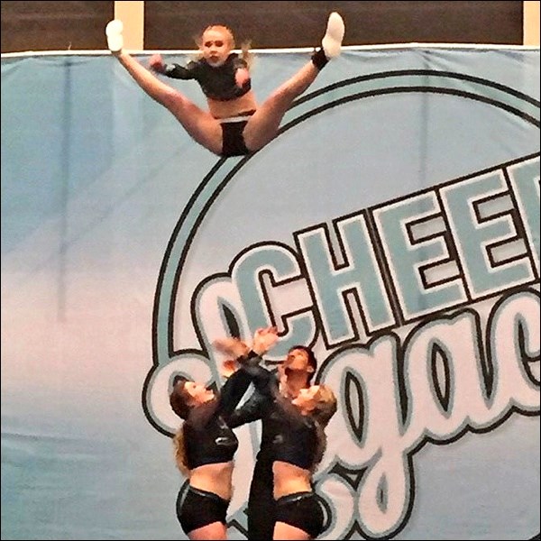 This photo shows a stunt group with resilience! Their toe touch basket toss did not look like this t