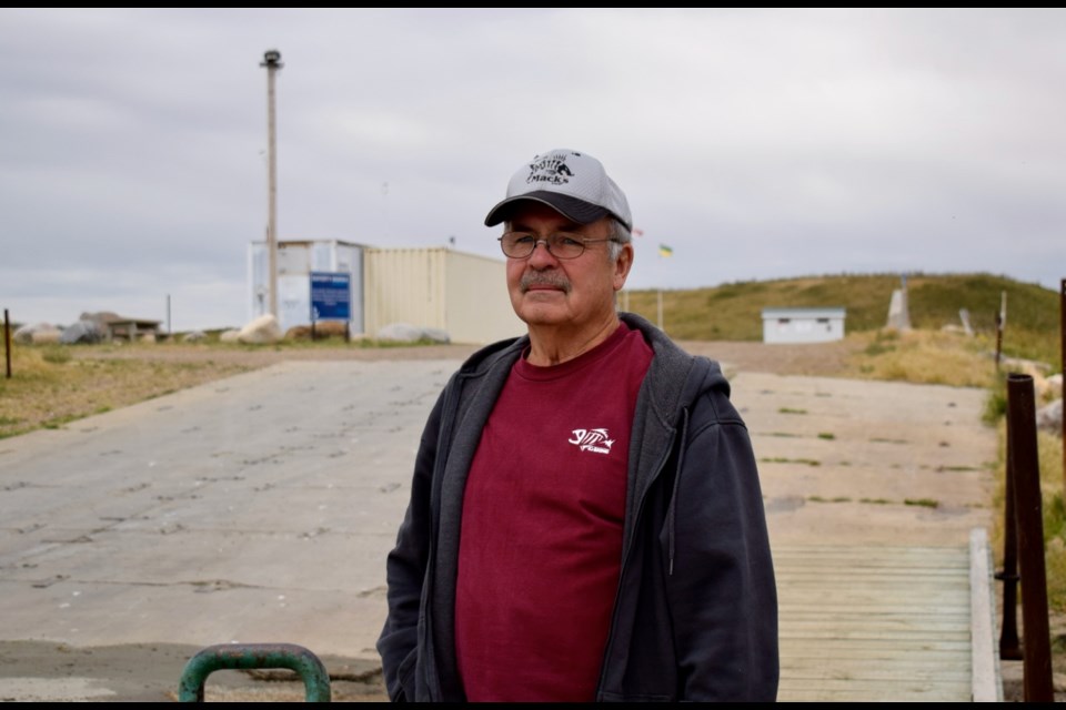 Volunteer Barry Dies comes to the Rafferty Marina almost every day to maintain the area. Photo by Anastasiia Bykhovskaia