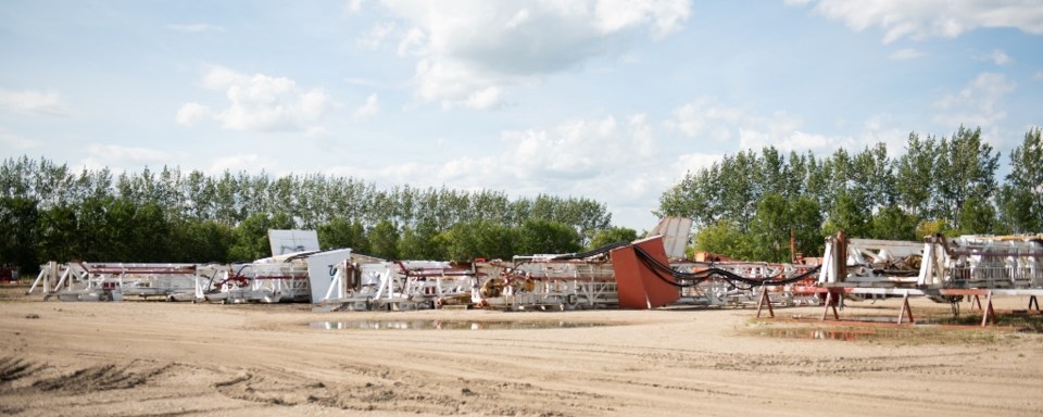 On Aug. 15, you could see five drilling rig derricks were lined up, ready to be scrapped, in the for