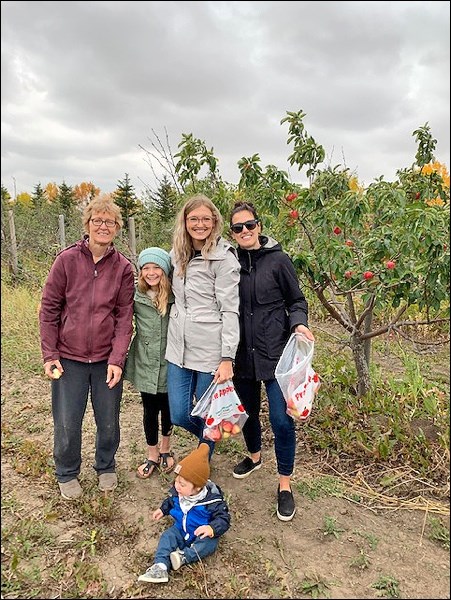 Karen Meier, Kirstin Negenman and Katrina Volk are family who help with the Symtree Orchard’s harves
