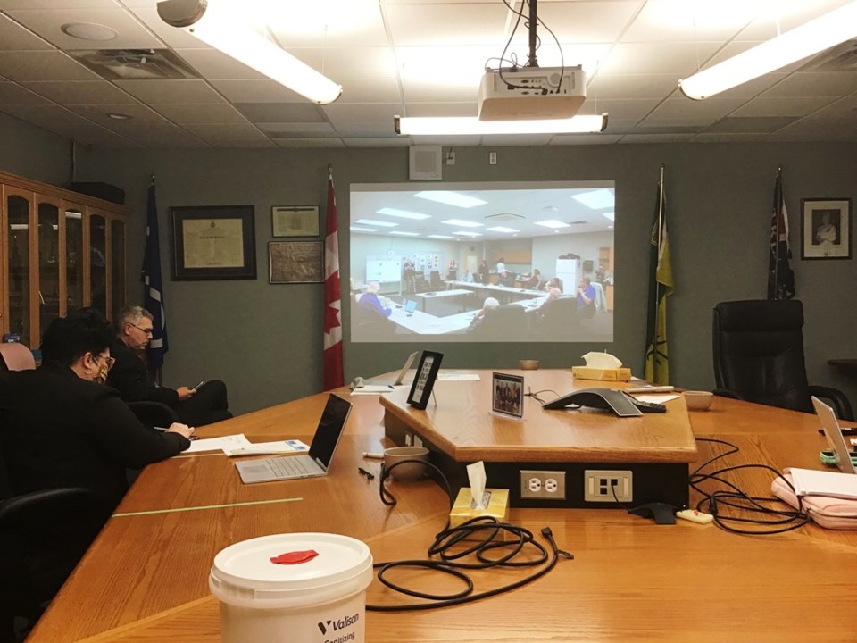 School division administration staff watch the live feed of Wednesday’s Living Sky School board meet