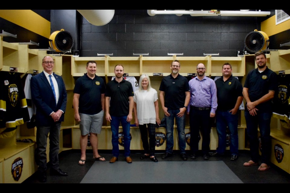 From left, Mayor Roy Ludwig, Estevan Bears director of player personnel Cole Zahn, committee member Blake Jamieson, Becky Areshenkoff, committee member Brad Robinson, Rotary Club of Estevan board member Ryan Siever, Estevan Bears chair of the board of directors Chad Farr and Estevan Bears head coach Jeff Smith participated in new dressing room dedication ceremony at Affinity Place. Photo by Anastasiia Bykhovskaia