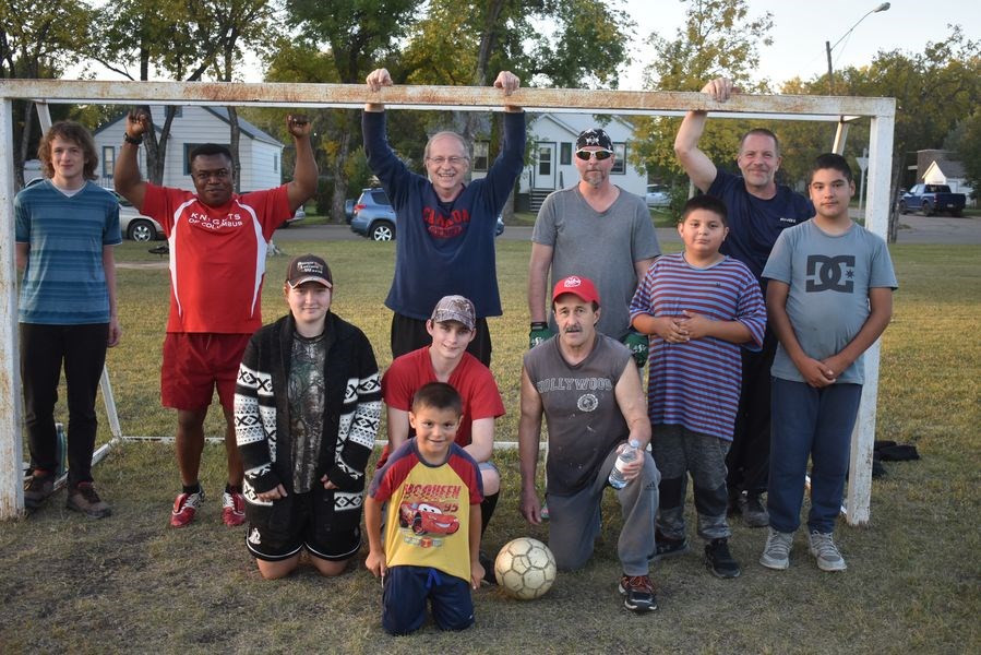 Among the players who met at the Victoria School grounds on September 11, from left, were: (back row) Jeremy Ruten of Saskatoon, Franklin Emereuwa, Stephen Ruten, Greg Leis and Bryan Semeniuk; (front) Megan Raffard, Eric Moriarty, Sid Novitski, Tye Stevenson and Jesse Gigun, and kneeling at front, Bo Stevenson. Also playing but not available for the photo were: Jimmy Tao, Max Kuzmenchuk, Morgan Raffard, Tyson Kazakoff, Brooke Taylor, Nicholas Bielecki and Dr. Ovie Albert's three children, Kevwe, Odafe and Runo (who goes by Brian).