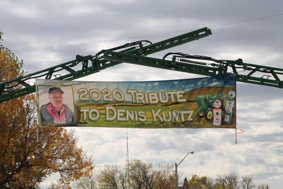 The family of Denis Kuntz hung this banner from two sprayers on Appleton Avenue. Photo submitted