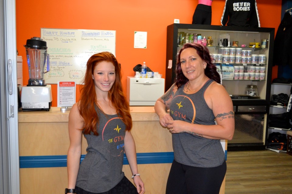 Manager Melissa Hala, left, and co-owner Treena Hirsch are pleased with the amount of traffic in The Gym so far.