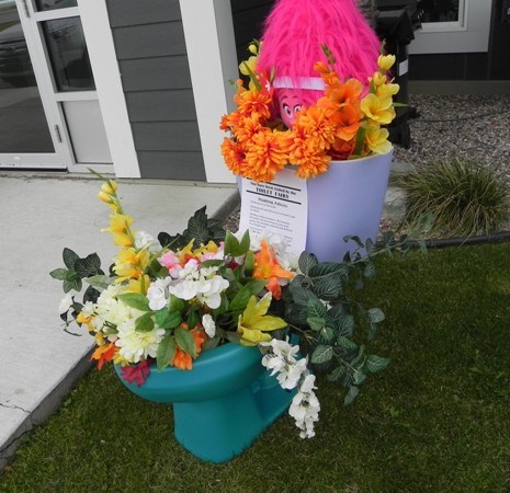 This lavish porta potty, created for a Parkview Place fundraising project, has been garnering much attention and many laughs. Photo by Sherri Solomko