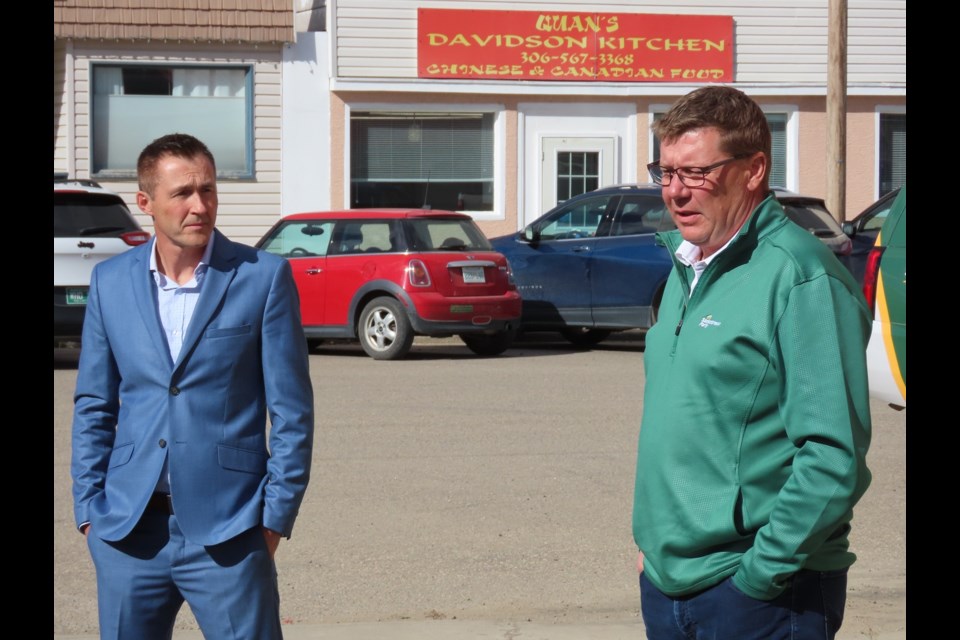 The Saskatchewan Party's Arm River candidate, Dana Skoropad, speaks with party leader Scott Moe outside Skoropad's campaign office in Davidson on Wednesday, September 30.