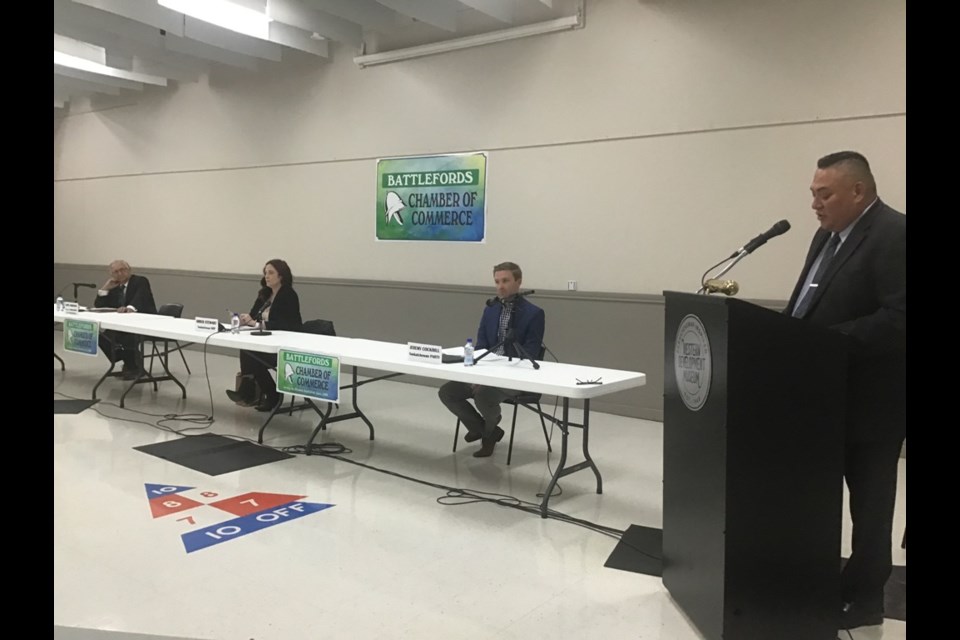 Candidates (left to right) Harry Zamonsky, Amber Stewart and Jeremy Cockrill and Battlefords Chamber of Commerce chair Harris Sutherland are seen here at the Battlefords chamber’s provincial all-candidates forum at the Western Development Museum.