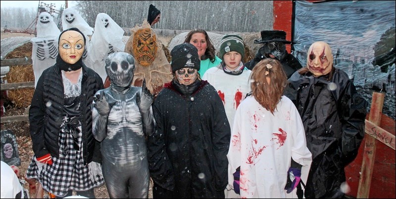 Planning for the Haunted Forest and Insane Asylum that Linda Price and her family set up in their rural yard begins in August with a lot of work being done to set up the spooky event that runs three weekends preceding Halloween. Photos by Alan Laughlin