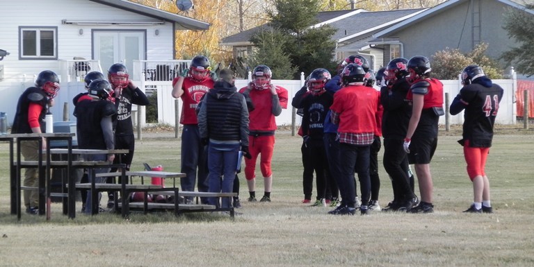 Even though practices might be all this football season incurs, Warrior football players cherished the opportunity to suit up once again and spend some time on Warrior Field this fall. Photo by Sherri Solomko