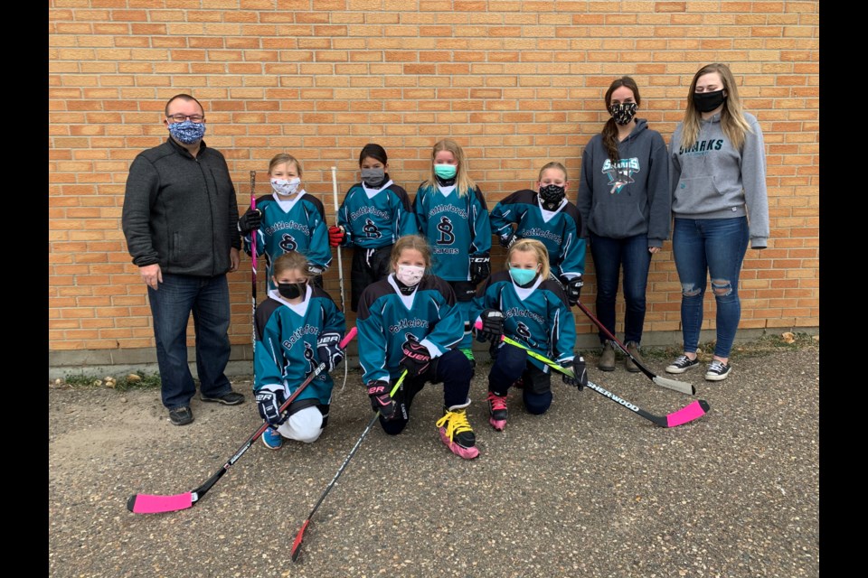 The U9 Girls team. Left to right head coach Bryce Bohun, Katie Bohun, Shi-lee Baptiste-Roan, Hailey Young, Ellie Russell assistant coaches Rachel Harper, Kaitlyn Korpach Front left to right: Elly Lapointe, Zarhli Crisp, Fara Davis Missing Aubree Bouvier, Harper Demarais-Corrigal, Kaylee Corrigal, Lauren Weber.