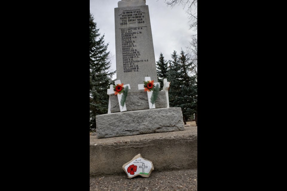 While Remembrance Day 2020 was a much different experience than before, residents still took the time to show their recognition of veterans and Remembrance Day by placing crosses, wreaths, candles or painted rocks at the cemetery, cenotaph and along pathways in town. Photos by Sherri Solomko.