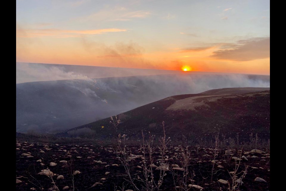 The terrain with its hills, rocks and not many roads made the fire extremely difficult to contain. Photo submitted