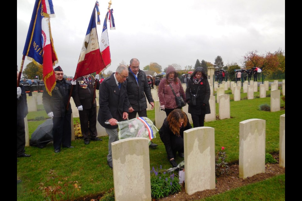 Laying flowers: Flag bearers, Gérard Thiery, Mayor Daniel Prouille, Nora Ring laying the flowers, Nadine Parohl, Charline Rhinehart. Photos submitted