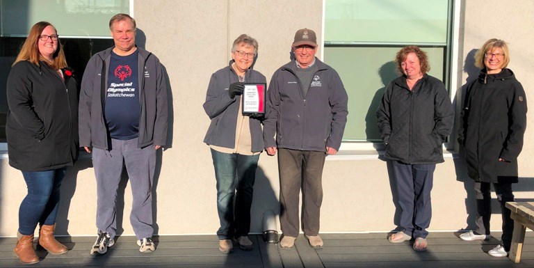 The Special Olympics Saskatchewan Unity and District Community Executive Committee accepts the Community Service Award, from Special Olympics Sask. In the photo are Kim Dainard, member at large, Byron O., athlete representative, Lucy Koenig, chair; Ron Koenig, member at large, Andrea Eddingfield, secretary, and Shana Hammer, treasurer. Photo submitted