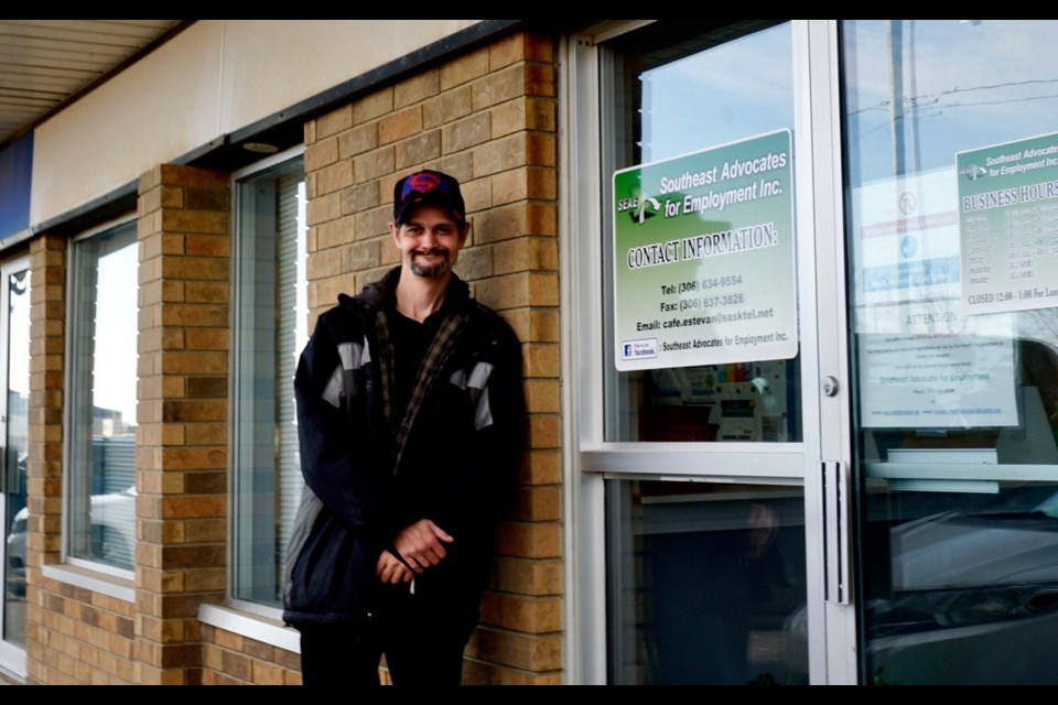 James Vollans will paint the windows of the Southeast Advocates for Employment building in Estevan. Photo by Anastasiia Bykhovskaia