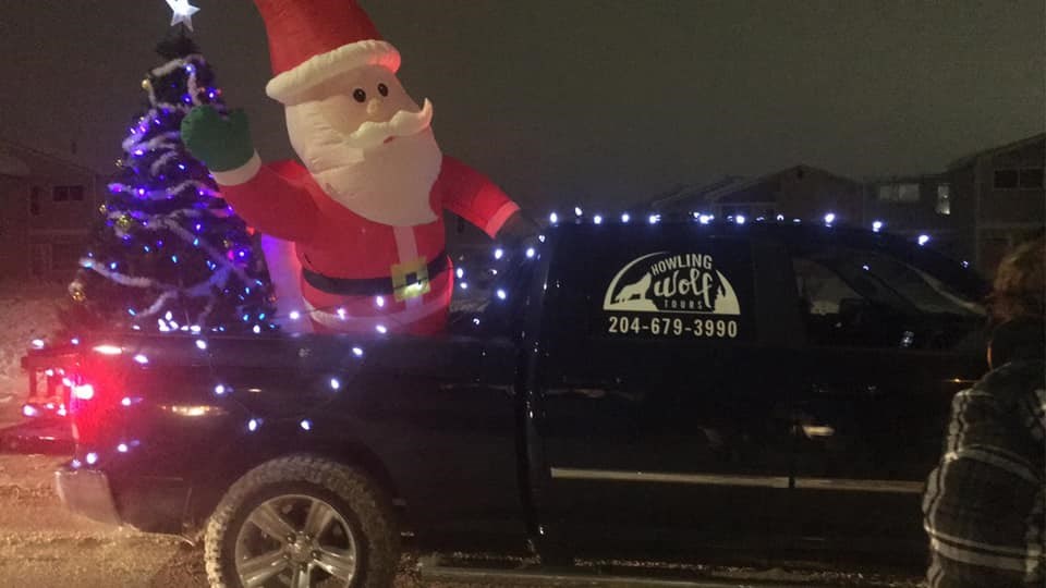 Geoff Greenfield brought some joy to the world Dec. 4-5 by driving around Thompson dressed as Santa