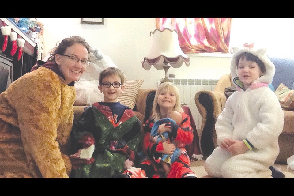 Cheryl Lyons and some young students are dressed to share the Nativity story. The young boy dressed as the sheep is Timothy, a child Cheryl and her church prayed for when medical treatment wasn’t available as hospitals fought COVID-19. The update on his prognosis is truly a miracle.