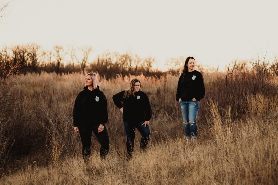 Amanda Jo Schoff, middle, asked a few of her friends to become models to help promote the Heartstrings Clothing Co brand. Photo by Brittany Leigh Photography