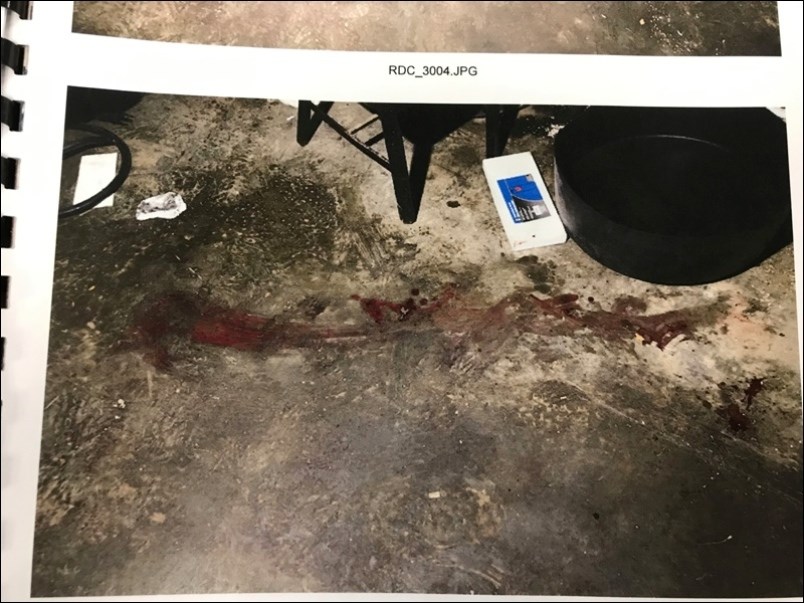 This RCMP evidence photo of blood inside the garage where the assault occurred was introduced during the trail in Saskatoon Court of Queen's Bench in February.