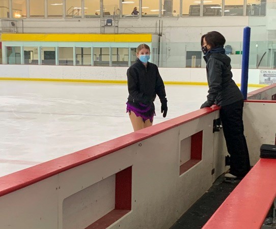 Unity Skating Club continues with their season in a revised manner according to pandemic protocols. Here coach Colleen Smith assists student Devyn McLean, who recently earned her gold dance. Photo submitted.