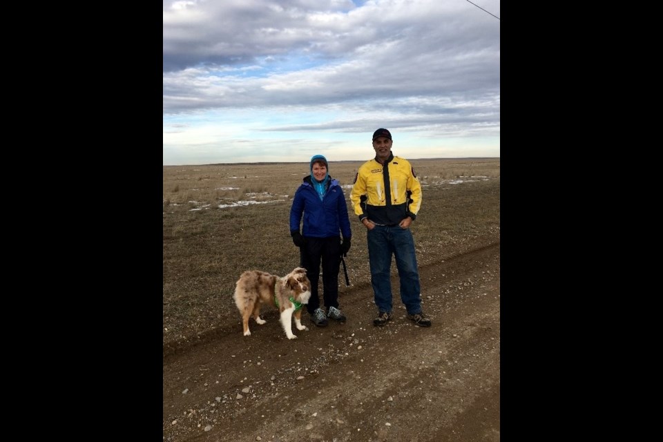 Canadian Search Dog Association member Dan Vas, right, and SESK SAR president Katia Bigney with her dog Happ after basic obedience training. Photo submitted