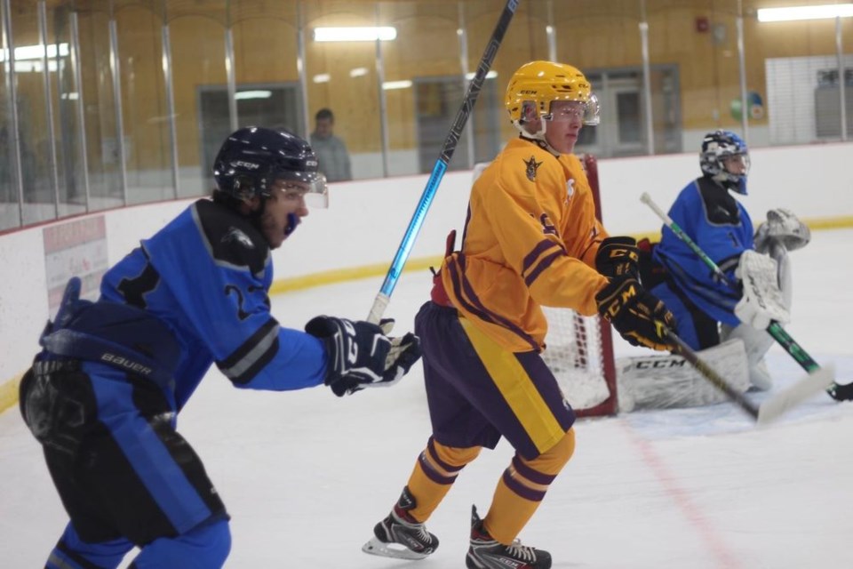 Wyatt Anaka (light jersey) was photographed in an on-ice drill for the Fox Creek Ice Kings Junior A team in Alberta where he made the team this season.