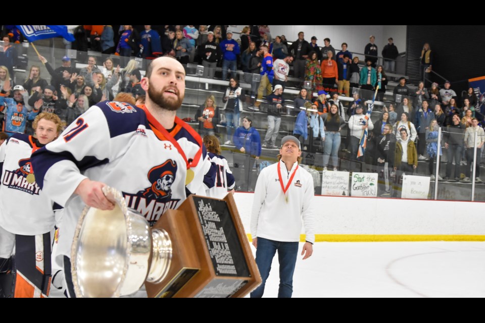 Creighton’s Zach Garrett hoisted the ACHA Division II national championship trophy April 20. Garrett and his University of Mary Marauders won the title in a year where Garrett was named national player of the year and an All-American in his league. - PHOTO BY BRIAN LARSON/UNIVERSITY OF MARY