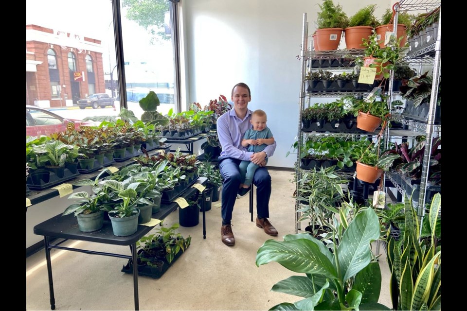 The owner of the Plant Bench, Kellan George, at the store with his son Hayes. Picture by Shelaia George