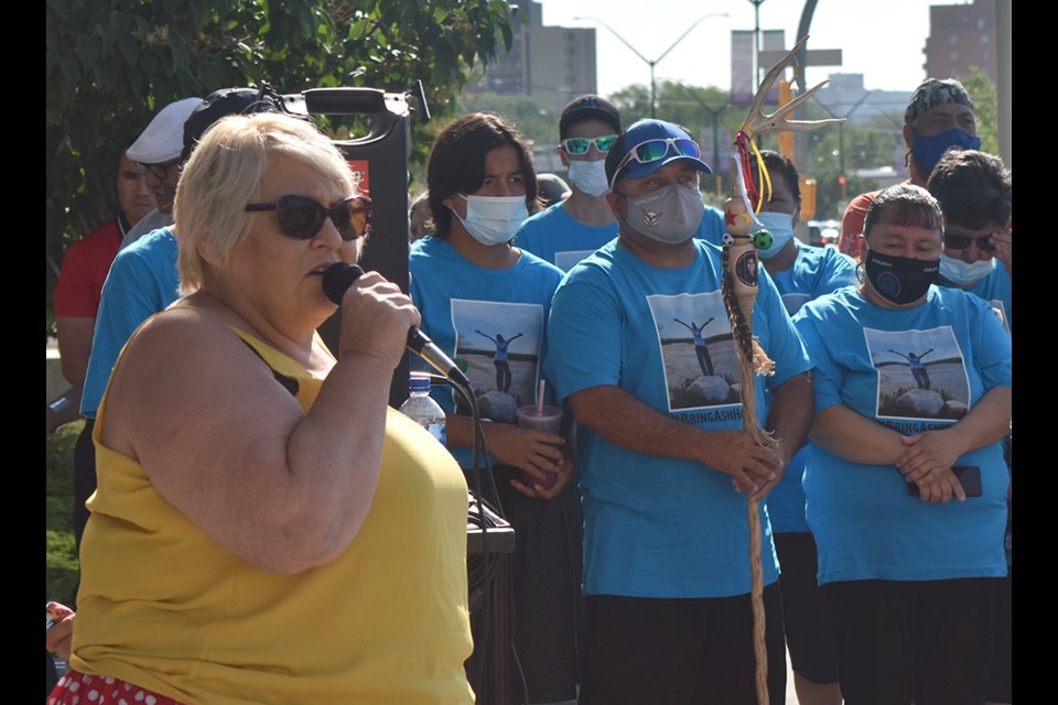 Federation of Sovereign Indigenous Nations Vice Chief Heather Bear addresses the crowd gathered for the Awareness Walk last Friday at the Saskatoon Police Service office.