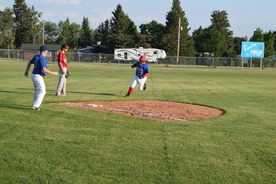 Leadoff hitter Evan Rostotski rounded third on his way to scoring a run in the win over Yorkton, with plenty of encouragement from third base coach Greg Andreychuk. Rostotski spearheaded the Supers attack with a team-leading three hits.