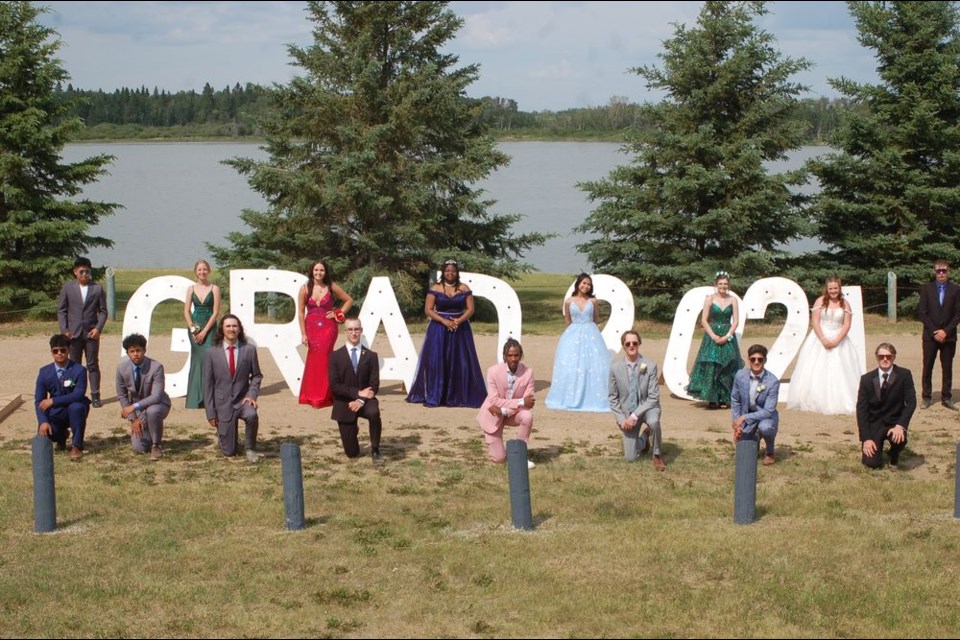 Members of the Preeceville School's 2021 graduation class from left, were: (back row) Leoj Viran, Almina Kovcic, Makenna Petryshyn, Kacey Wolfe, Janhia Irlandez, Emily Braithwaite, Hannah Delawski and Darrian Walker; and, (front) Christian Acosta, Dweight Paligan, Jesse Prestie, Eric Prestie, Eli Kashuba, Todd Pankratz, Dylan Wiwcharuk and Reagen Nelson.