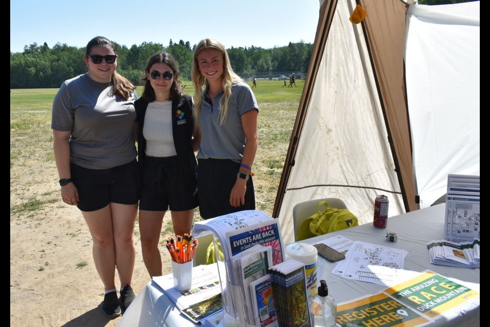 Race Organizers Sask Parks staff greeted visitors and registered participants for The Amazing Race in the morning hours of the Festival in the Forest at Duck Mountain Provincial Park.