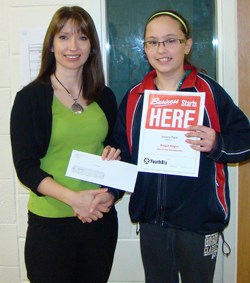 Brogan Regier of Weyburn won second place in the Grade 6 to 9 category, for her business idea, Clip-It and Accessories. (L-R) Verna O'Neill, CF Sunrise representative (left) presented the award.