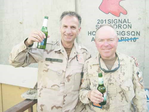 Major Ron Haskell and his Dutch comrade, Lieutentant-Colonel Rene Reijrink enjoy a "near" beer.