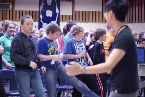 Cheng gets the students at Yorkdale Central School moving to begin a day of events May 10.