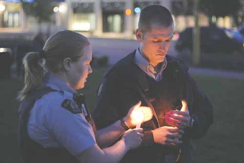 Friends, community members, and police attended a candlelit vigil in memory of Jimmy Ray Wiebe on June 20.