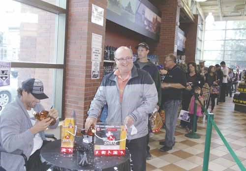 Jarret Stoll of the Stanley Cup-winning Los Angeles Kings stopped by the Yorkton Liquor Board store to sign "Skate" Whisky bottles for customers on August 15. The store had over 150 of the bottles stocked for a long line of hockey and whisky fans to receive autographs and meet Stoll.