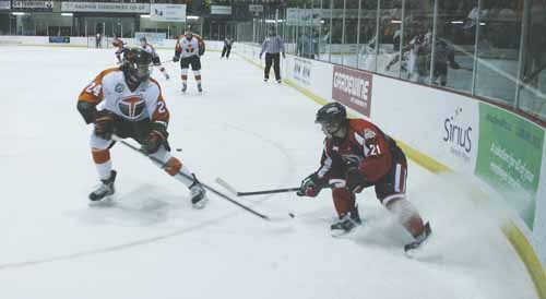 Terrier defenceman Turner Ottenbreit eyes a Dauphin King in the WCC final.