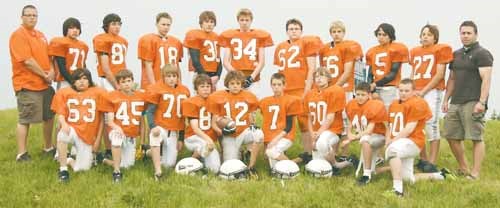 Kinsmen Minor Football League Lions - From left, front row: Gregory Deubrock, Darren Popowich, Drew Bulitz, TJ McBride, Nick Payne, Cody Dull, Jonah Sutter, Reed Krasowski, Leighton Levandoski; back row: coach Shawn Redmond, Caleb Bymak, Darius Haberstock, Jarettt Stumph, Clark Hoffman, Riley McGill, Caleb Sutter, Isaac Pasloski, Riley Kerr, Tanner Mak, coach Payne.