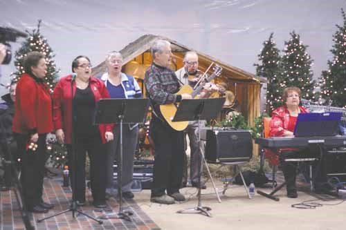 The Son Shine singers perform.