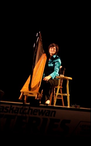 Cecile Denis, who plays both celtic and pedal harps, loves to take her audience on a journey through time and music.