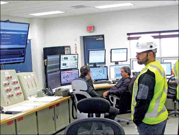The control room of the plant operates with two people. A second class power engineer monitors and controls the 260 MW combined cycle power plant. A third class power engineer works in the field completing rounds, water tests and various tasks. There are 21 monitors in the control centre.