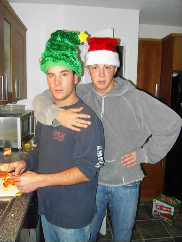 My co-chefs Kody and Nick with their Christmas toques on in the kitchen.